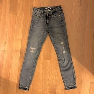 Calvin Klein stretch Jeans. 25x28. Frayed cuff. Distressed